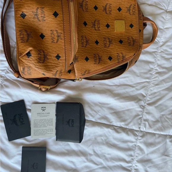 MCM Cognac Backpack with Black Accents Small Stark Backpack in Monogram Mix Cognac | MCM ®US main image 3